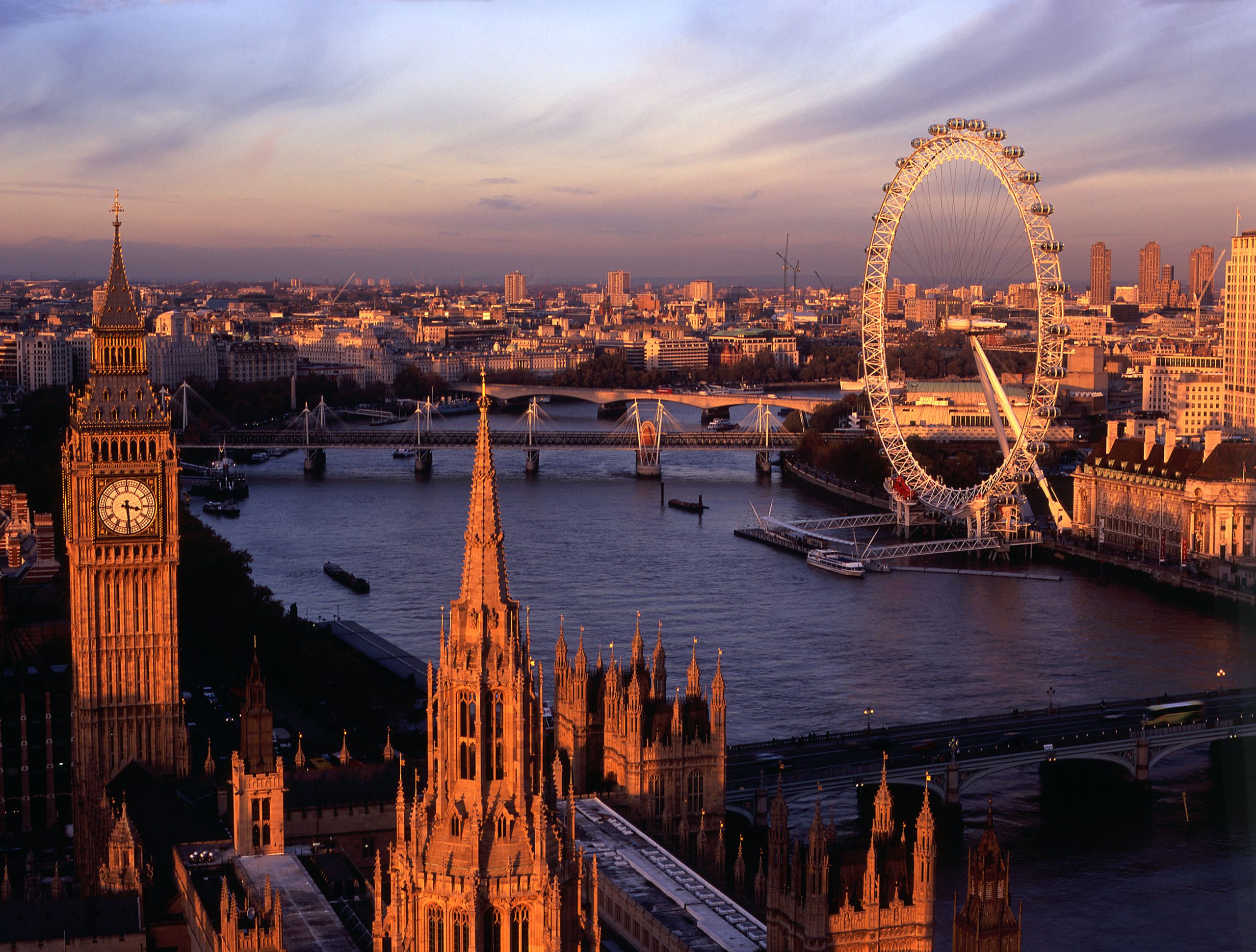 View from the top of the Victoria Tower, the lesser known of the two towers of the Houses of Parliament, towards Big Ben, the River Thames and the London Eye
